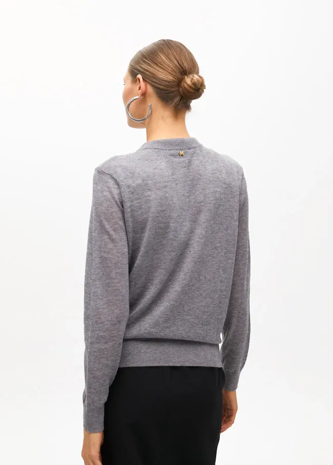 Sweater with scarf detail at the neck