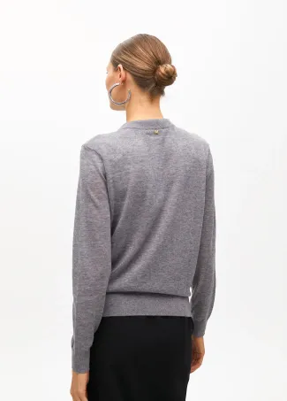 Sweater with scarf detail at the neck