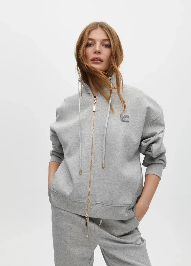 Sweatshirt with zip opening and side detail