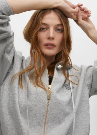 Sweatshirt with zip opening and side detail