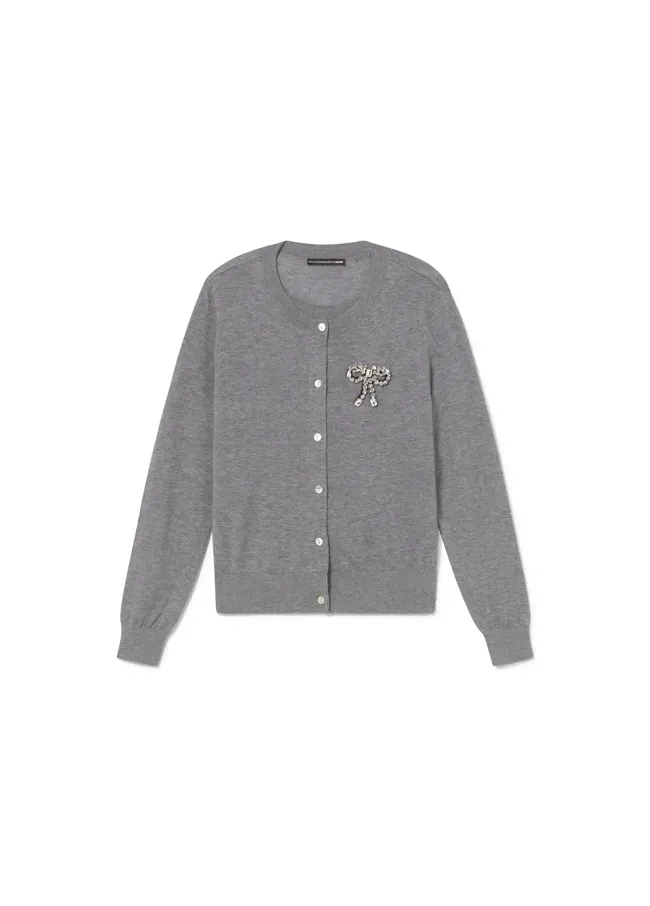 Cardigan dos piezas con joya lazo