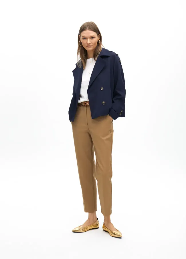 Stretchy chinos with rhinestone logos