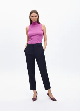 Stretchy chinos with rhinestone logos