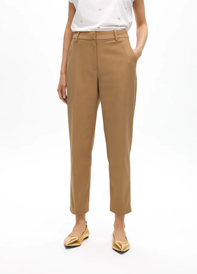 Stretchy chinos with rhinestone logos