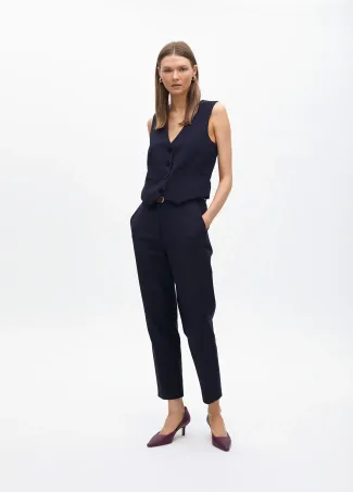 Stretchy chinos with rhinestone logos