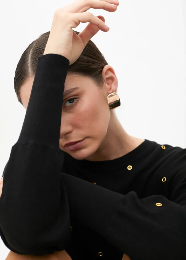 Drop sleeve sweater with eyelets