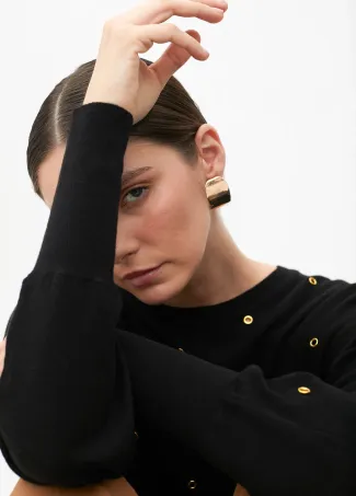 Drop sleeve sweater with eyelets