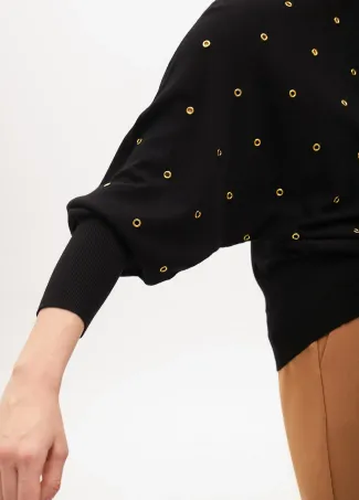 Drop sleeve sweater with eyelets