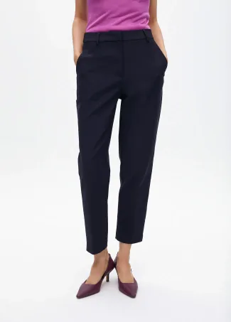 Stretchy chinos with rhinestone logos