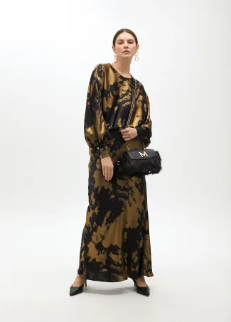 Long printed dress with asymmetrical sleeves