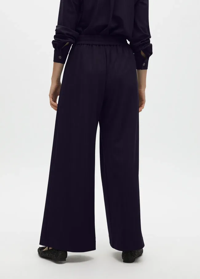 Pinstripe darted lamé trousers