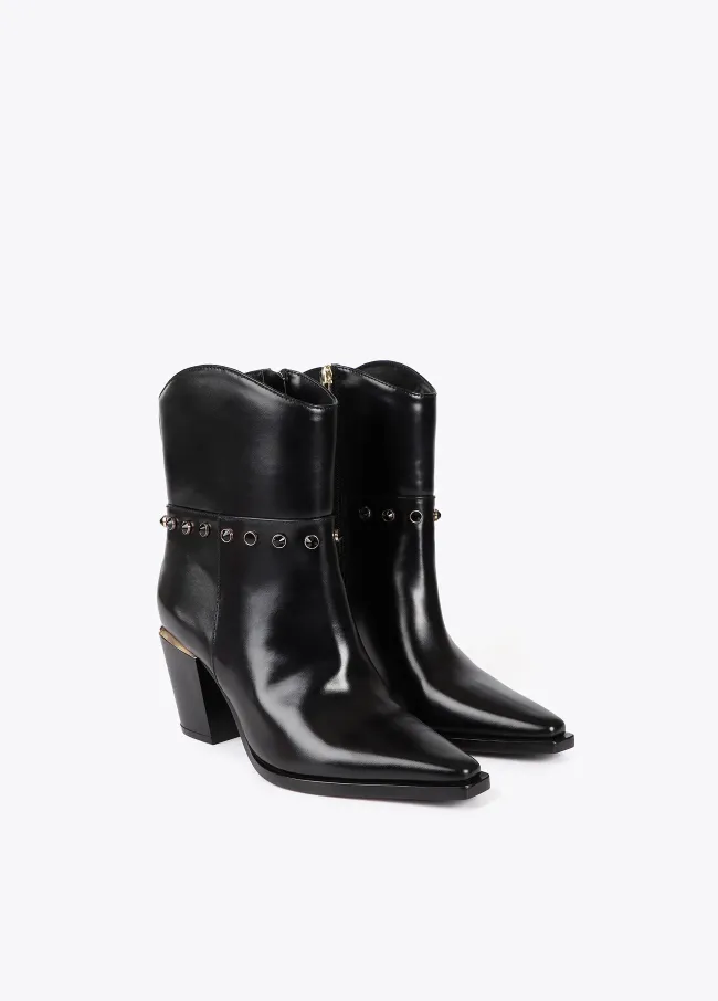 Heeled cowboy ankle boots with metallic details