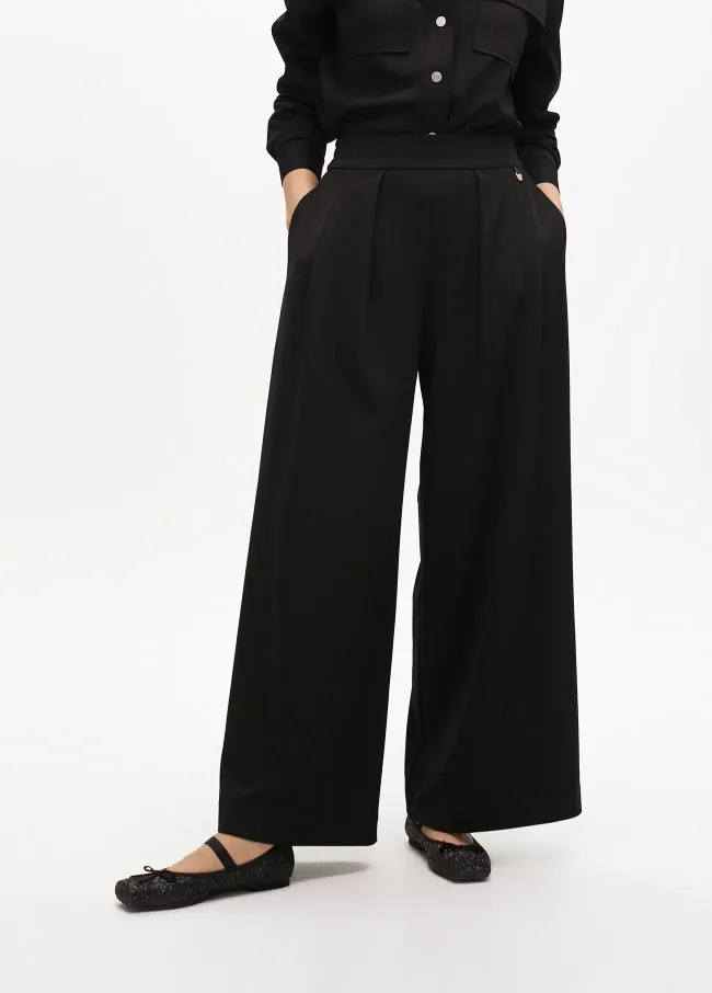 Pinstripe darted lamé trousers