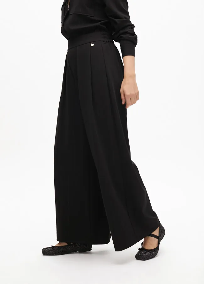 Pinstripe darted lamé trousers