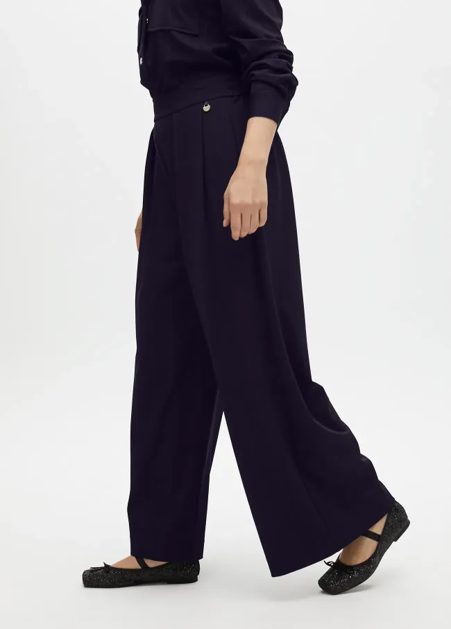 Pinstripe darted lamé trousers