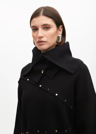 Deconstructed sweater with stud details