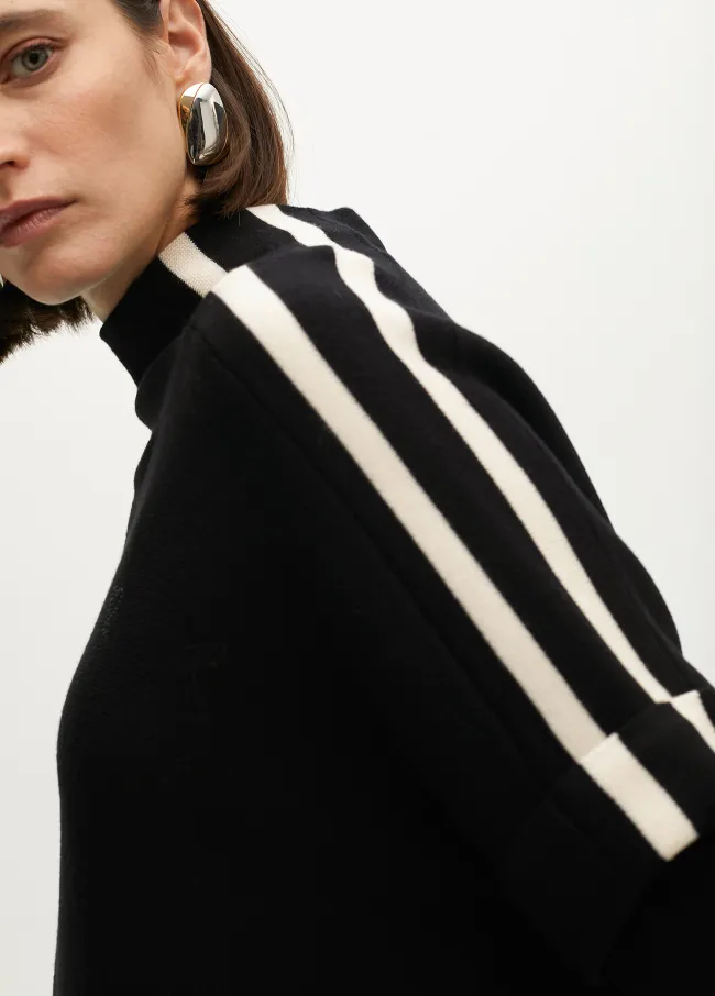 Sweater with contrast sleeve details