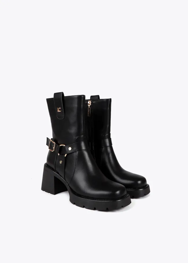Heeled biker boots with metallic details