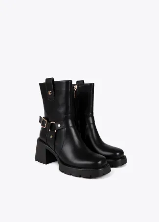 Heeled biker boots with metallic details