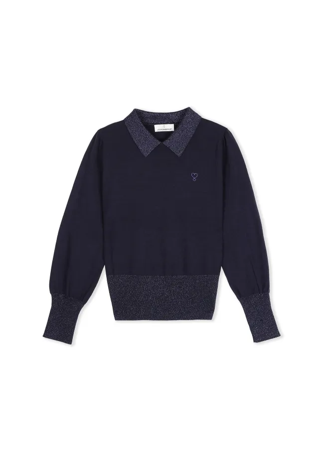 Jersey manga abullonada cuello tipo polo