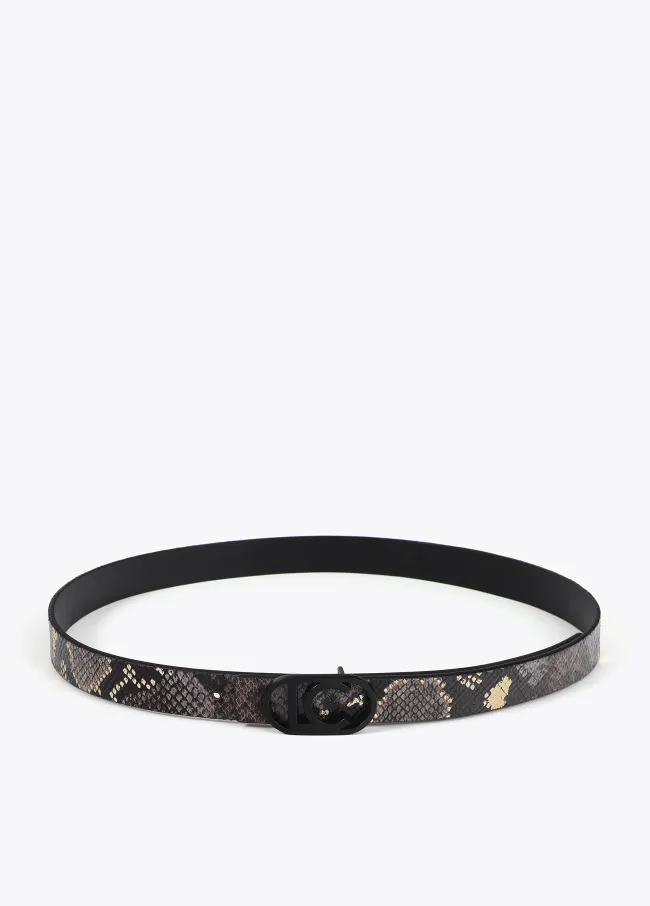 Pack of reversible animal print belts with...