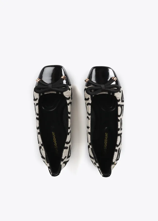 Ballet flats with round toe and front bow detail
