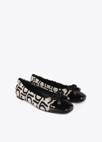 Ballet flats with round toe and front bow detail