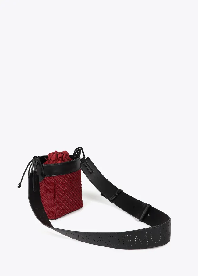 Bolso bandolera combinado tejido y efecto piel