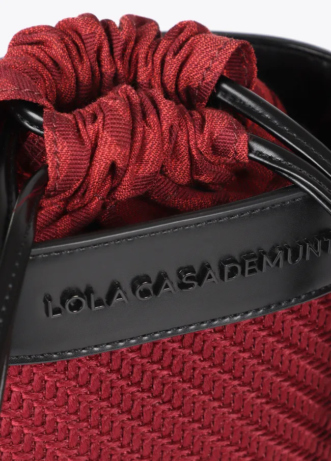 Crossbody bag in contrast fabric and faux leather