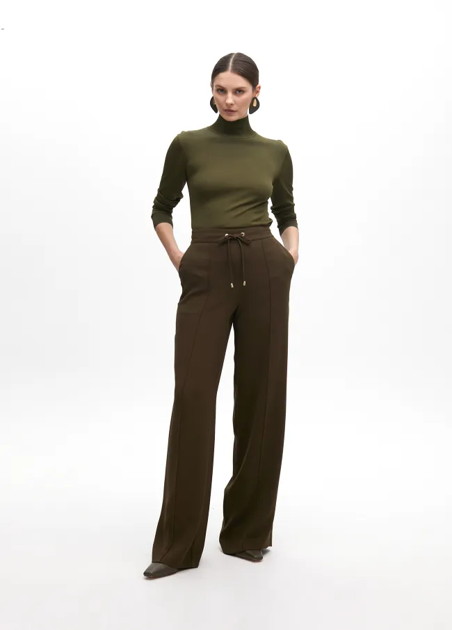 Straight trousers with elastic and central rib