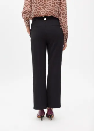Knitted trousers with buttons