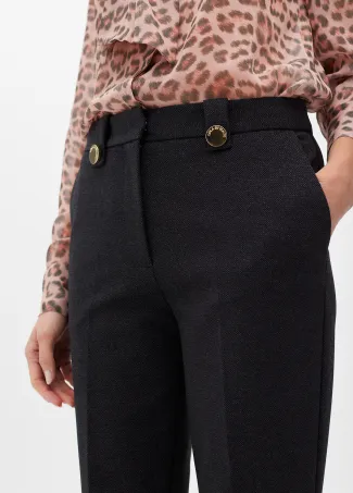 Knitted trousers with buttons
