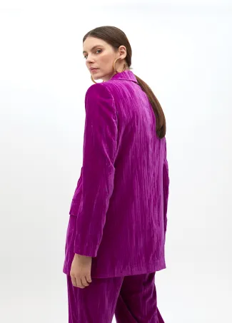 Velvet blazer with flower on lapel