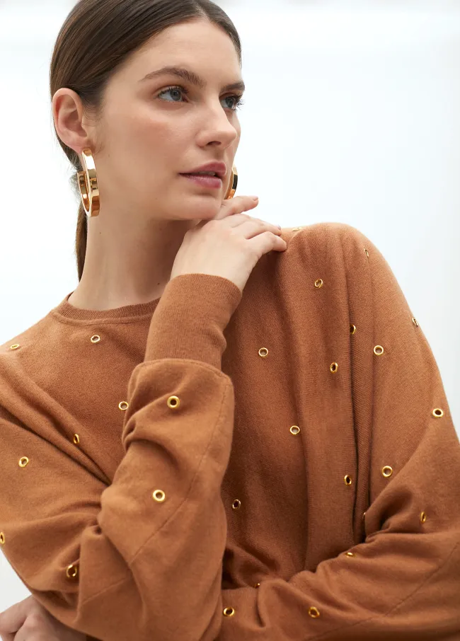 Drop sleeve sweater with eyelets