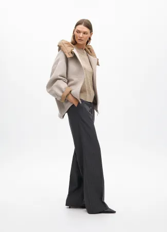 Short hooded coat in two materials: nylon and cloth