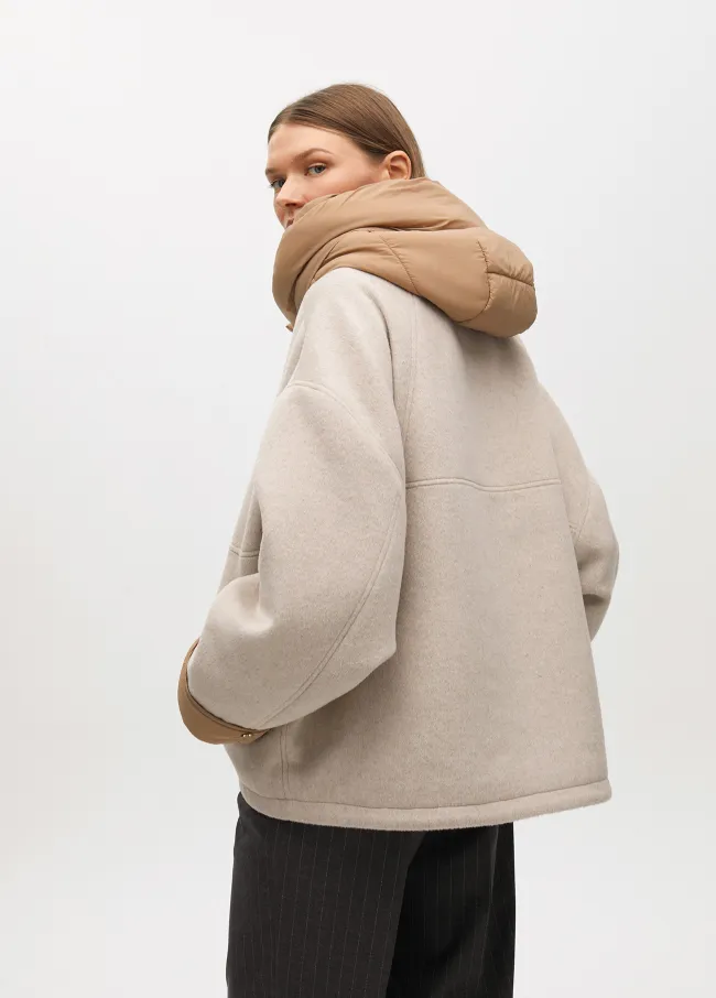 Short hooded coat in two materials: nylon and...