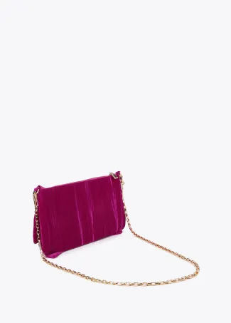 Cartera de mano con lazada frontal