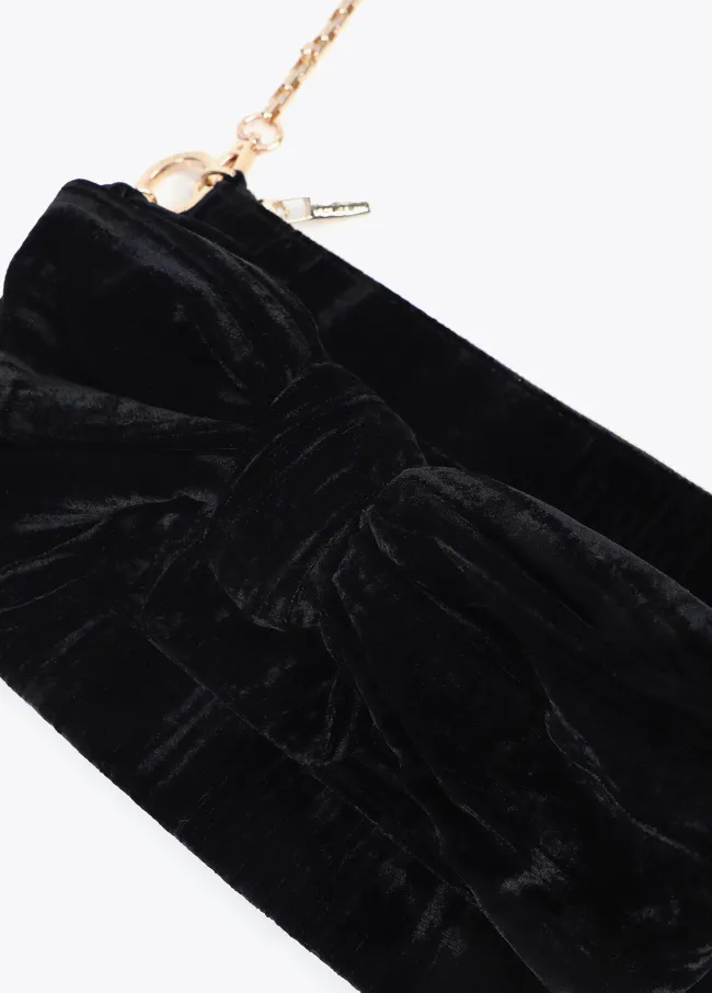 Cartera de mano con lazada frontal