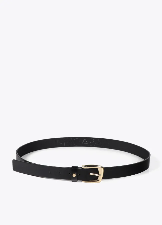 Belt with cutwork logo