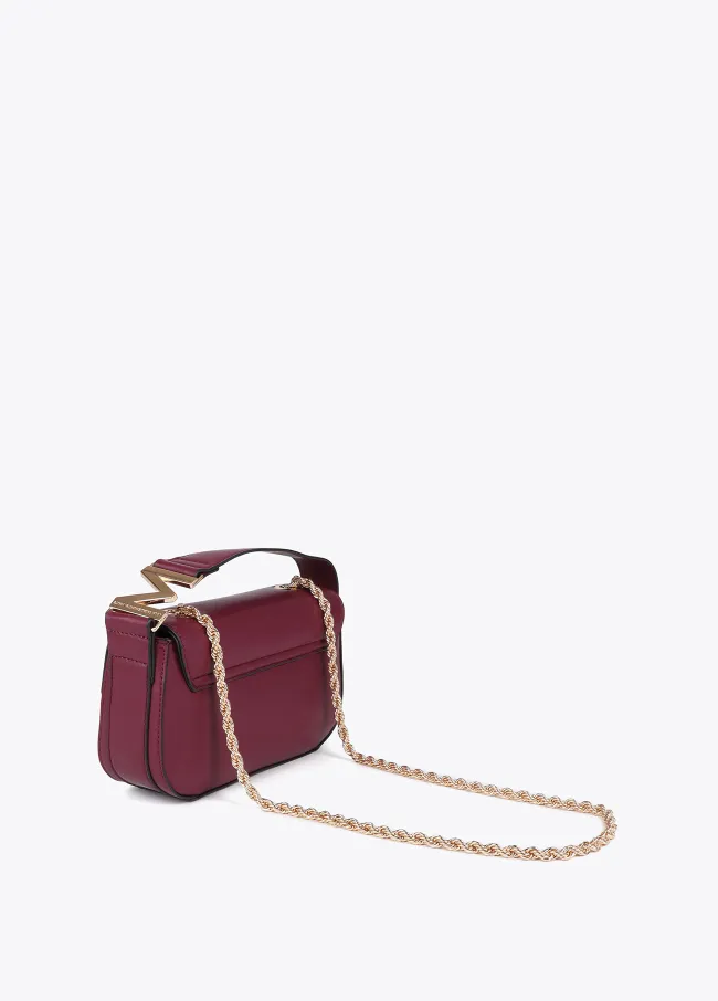 Crossbody bag with faux leather flap and M logo...