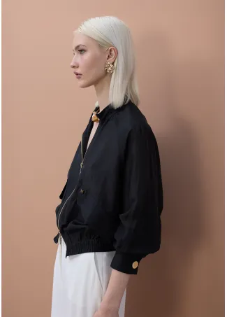 Chaqueta tipo bomber manga ranglán bolsillos