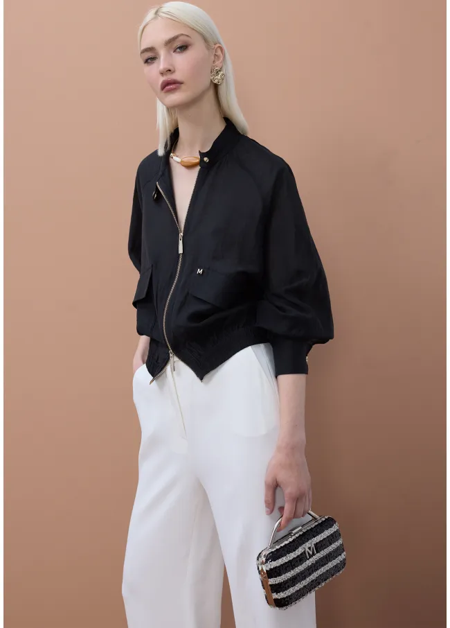 Chaqueta tipo bomber manga ranglán bolsillos