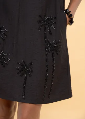 Vestido corto con detalles palmeras bordadas