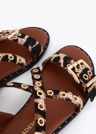 Flat sandals with straps and personalised buckles