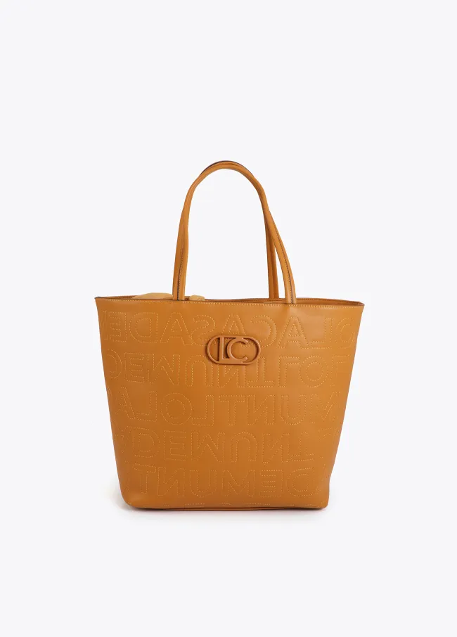 Deconstructed tote bag with monogram topstitching