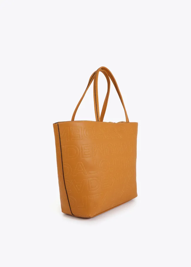Deconstructed tote bag with monogram topstitching
