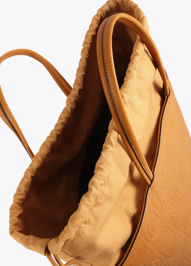 Deconstructed tote bag with monogram topstitching