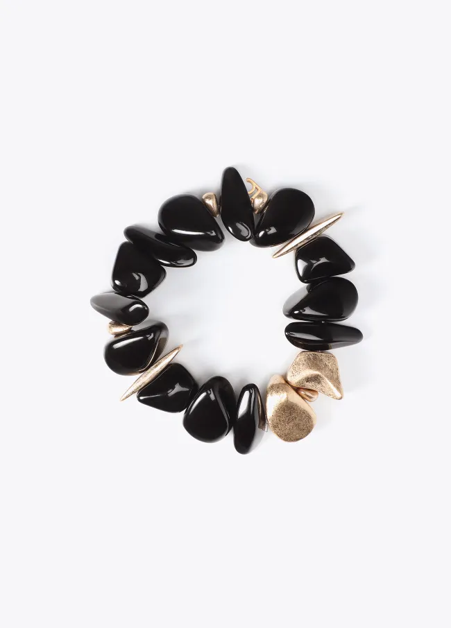 Pulsera elástica con piezas metálicas