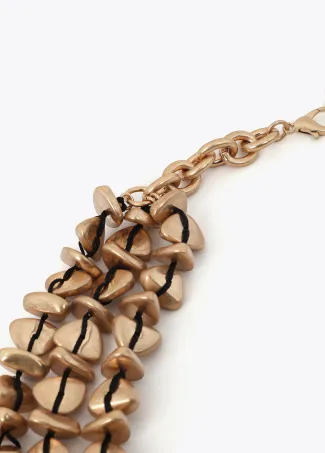 Multi-strand necklace with stone bead appliqués