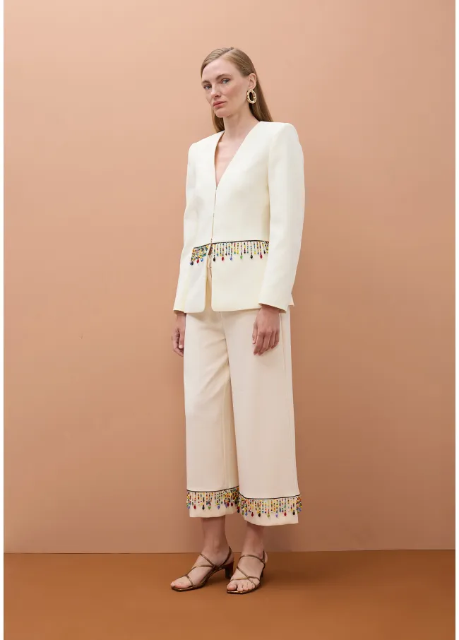 Pantalón con piedras multicolor